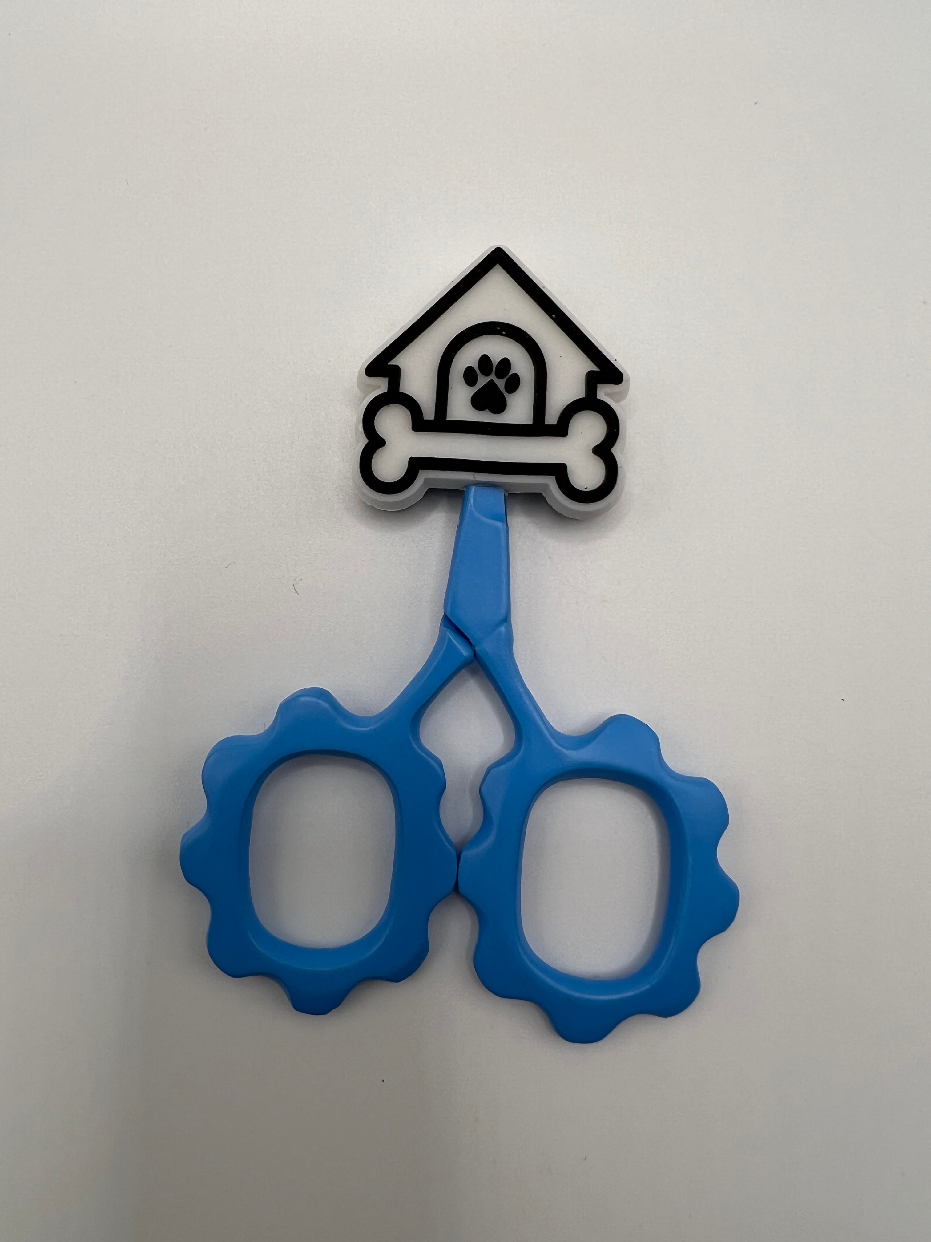 Dog house and bone scissor tip protector