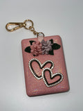 Iridescent pink floral heart needle case