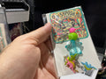Dinosaur cluster and blue star charm