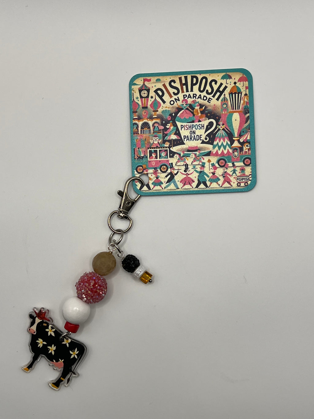 Black cow with flowers - charm