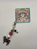 Black cow with flowers - charm