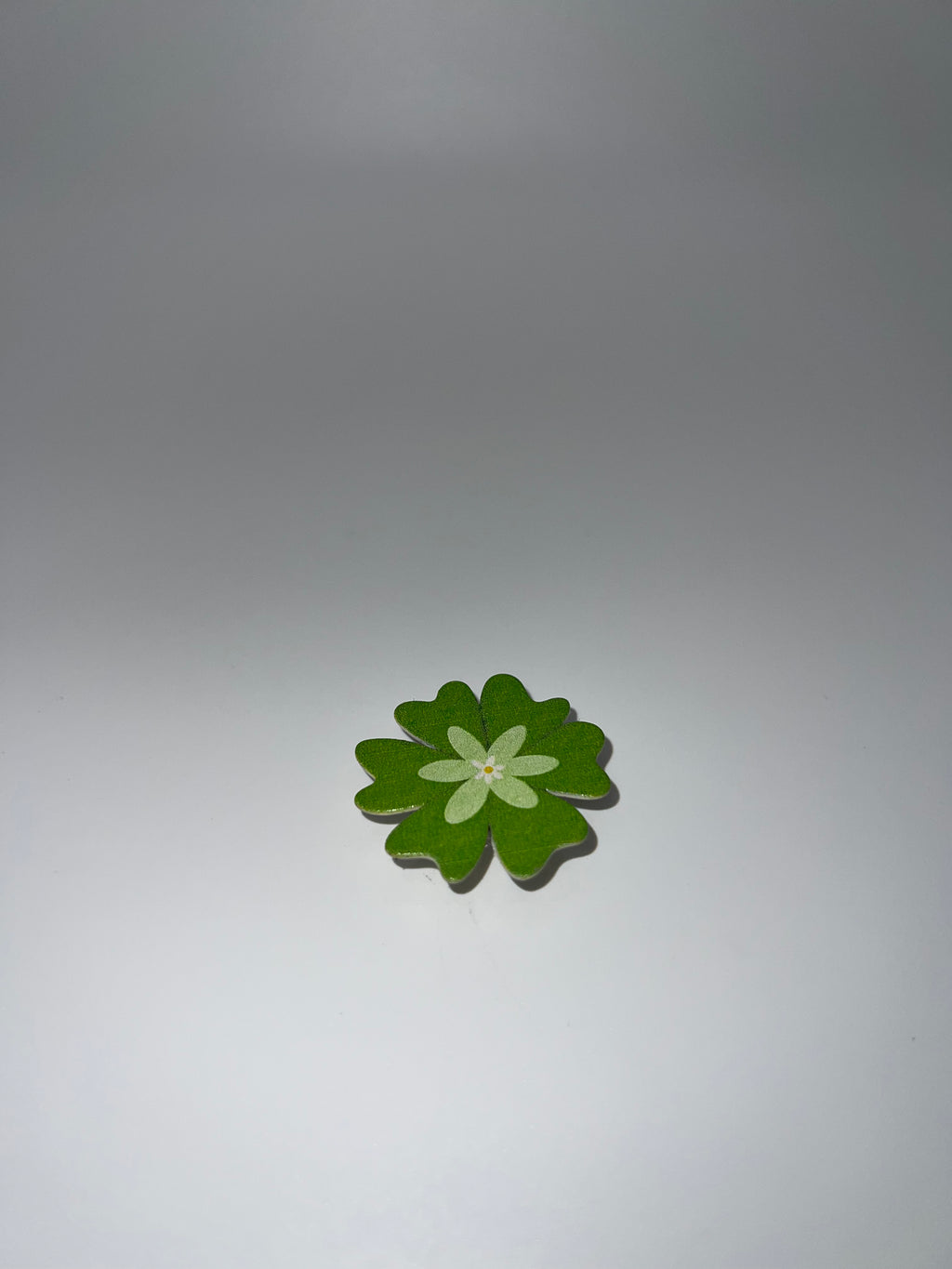 Green flower - needle minder
