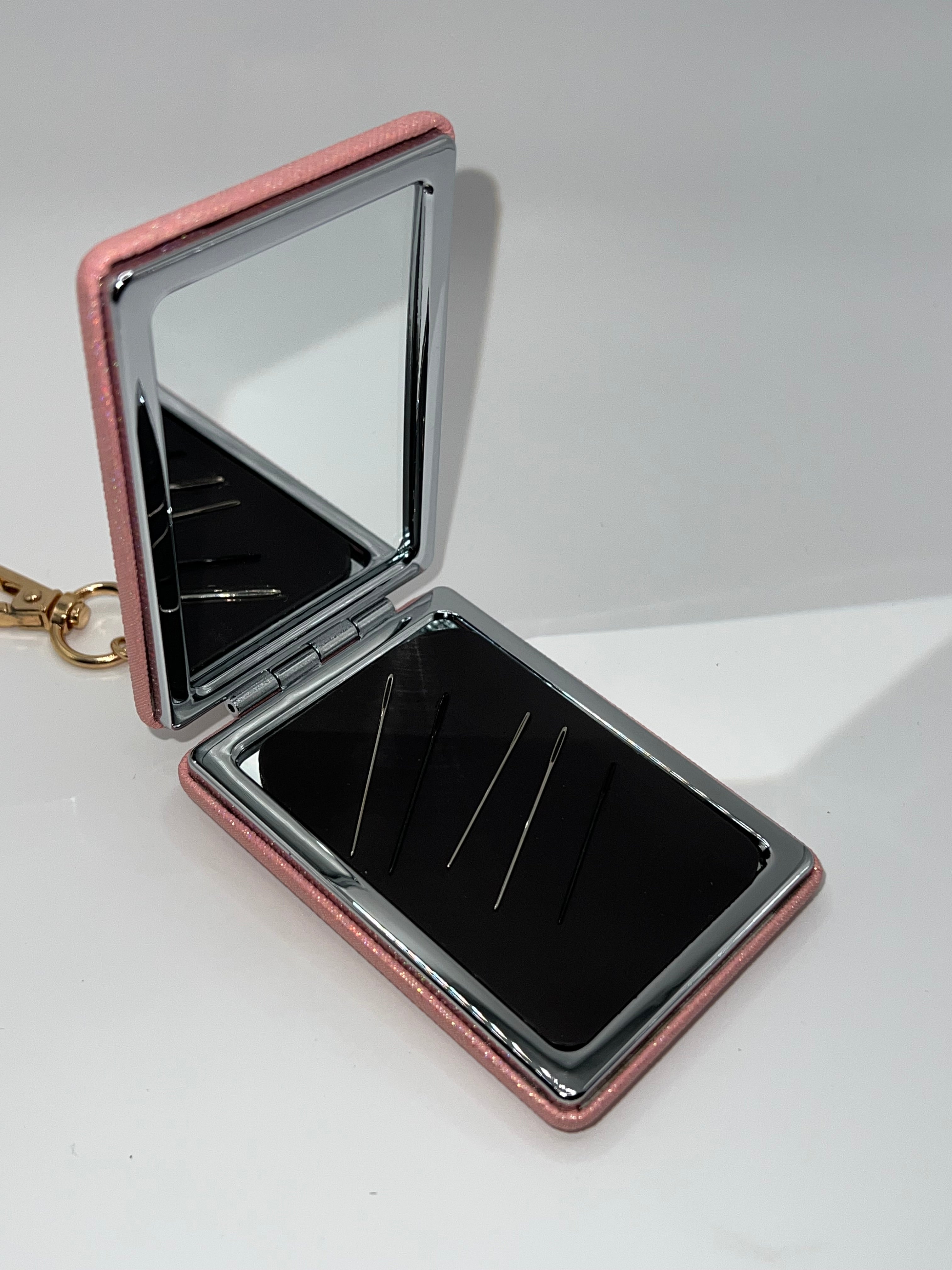 Iridescent pink floral heart needle case