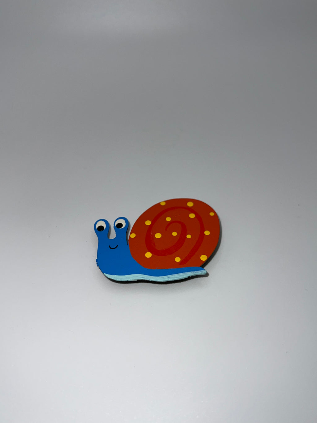 Blue and orange Snail - needle minder
