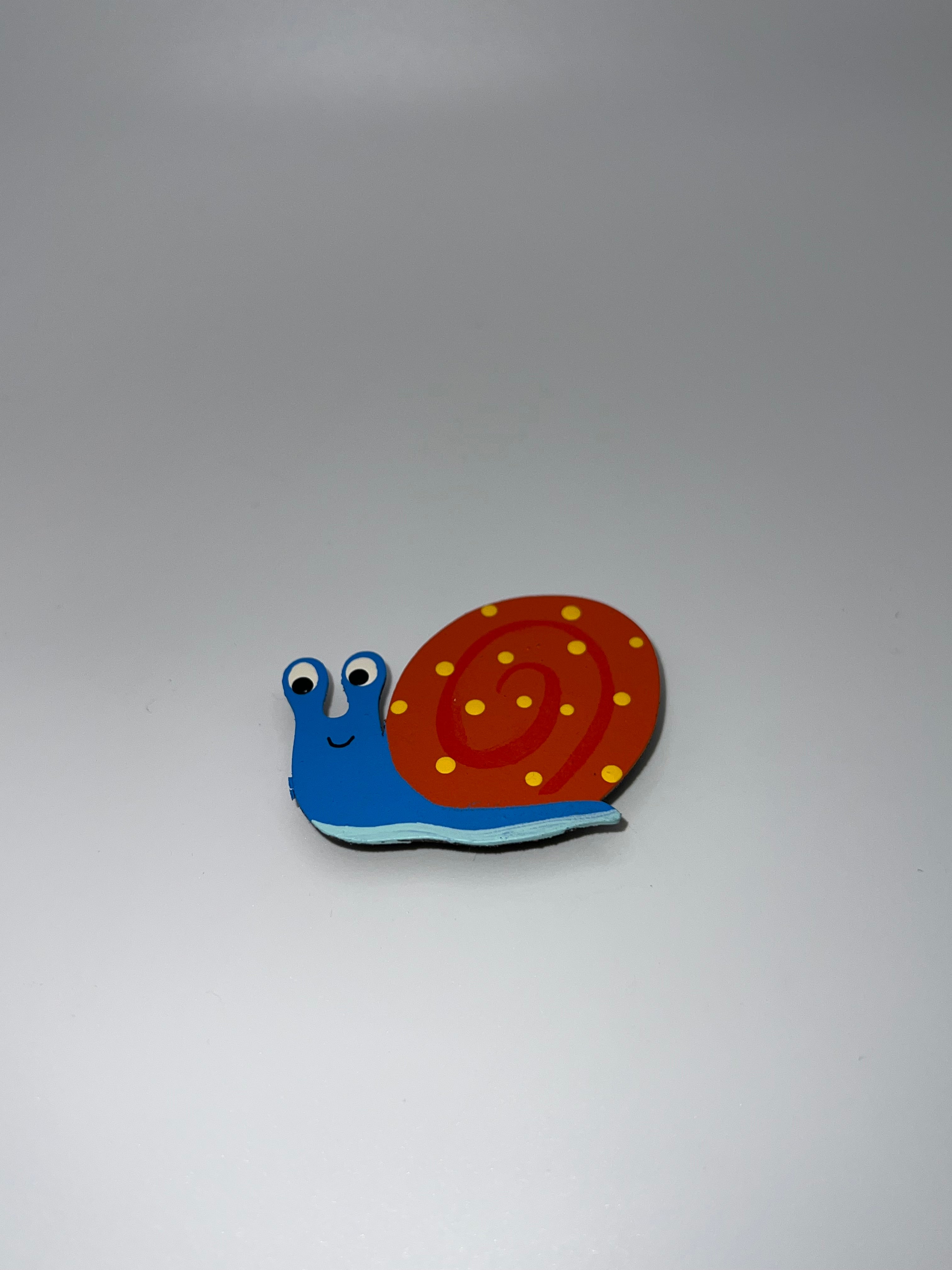 Blue and orange Snail - needle minder
