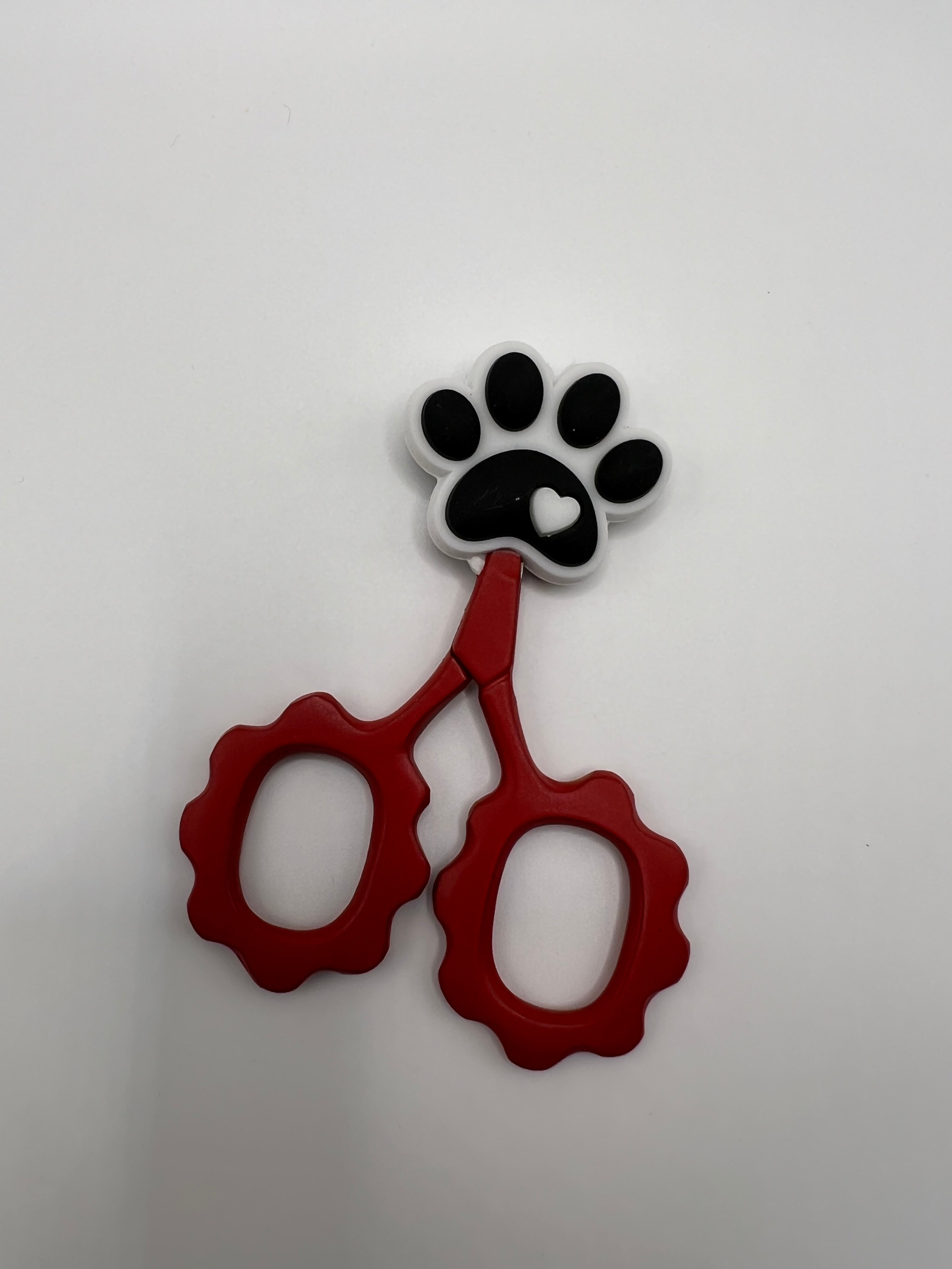 Black and white paw print with heart