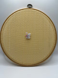 Cartoon bunny with flower needle minder