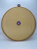 Purple flower needle minder