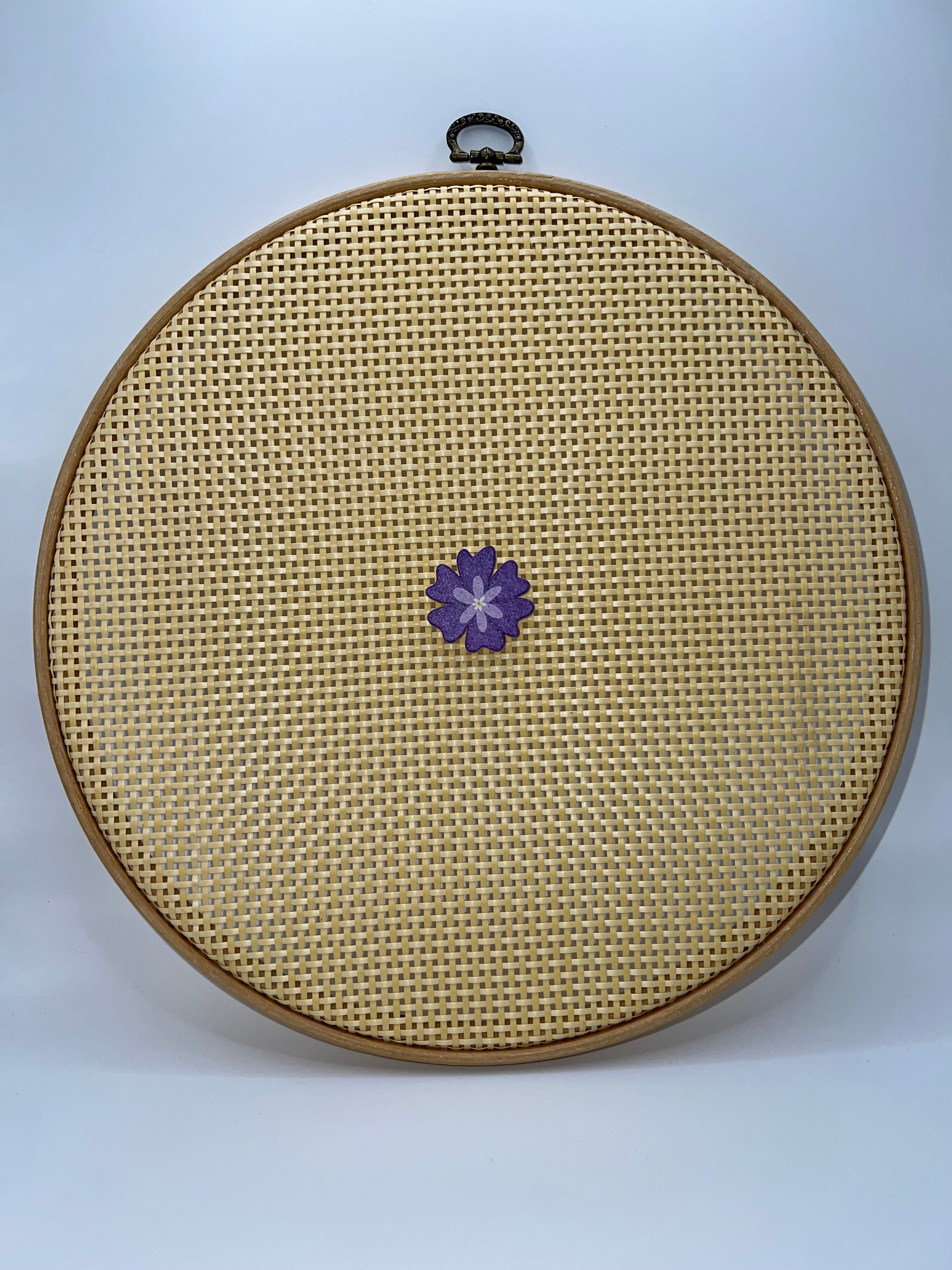 Purple flower needle minder