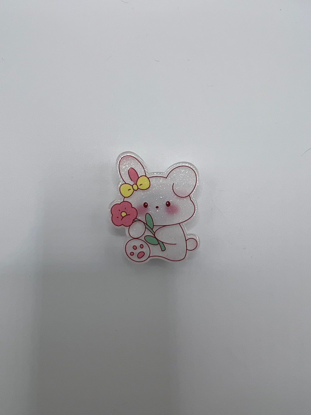 Cartoon bunny with flower needle minder
