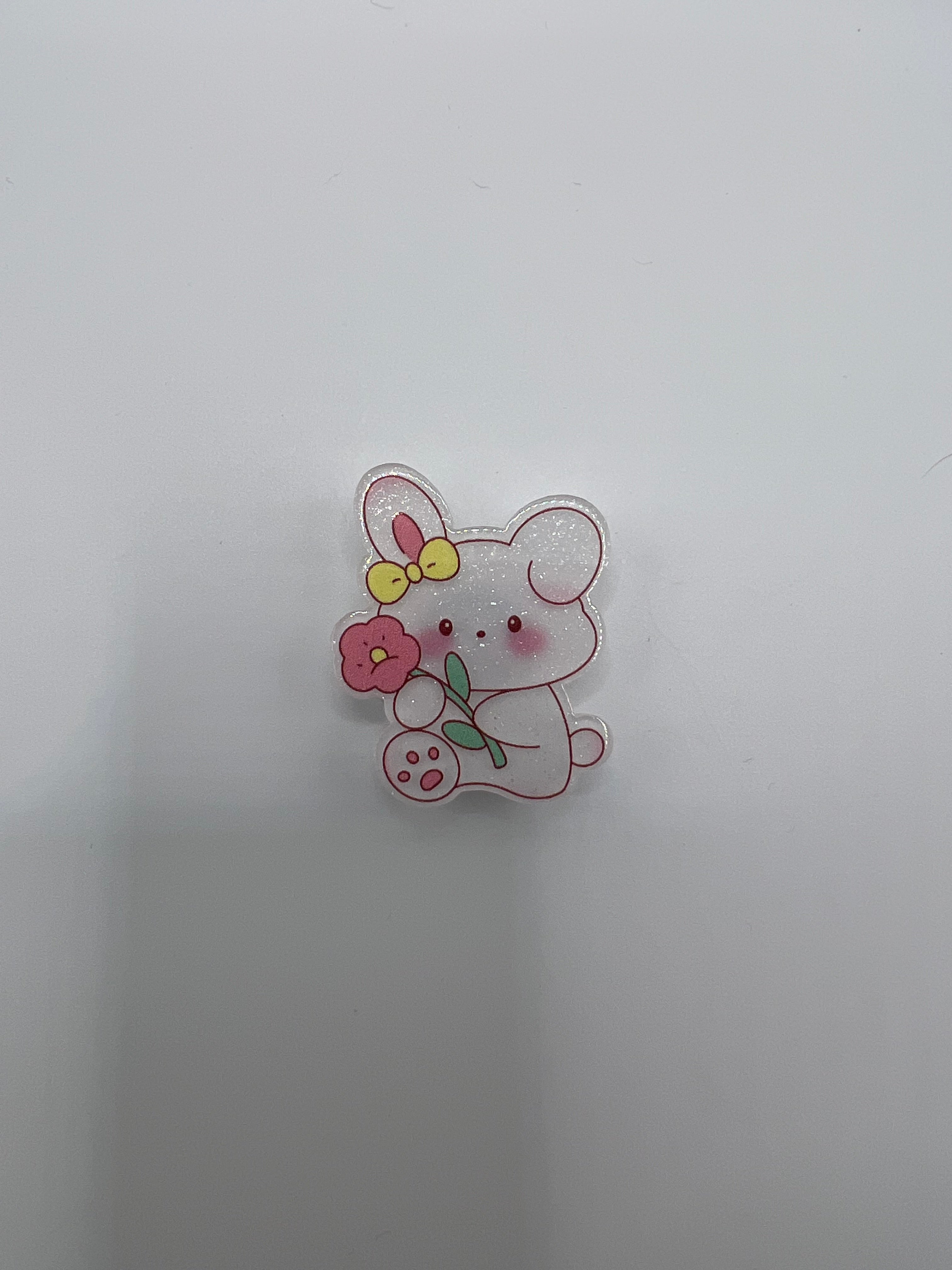 Cartoon bunny with flower needle minder