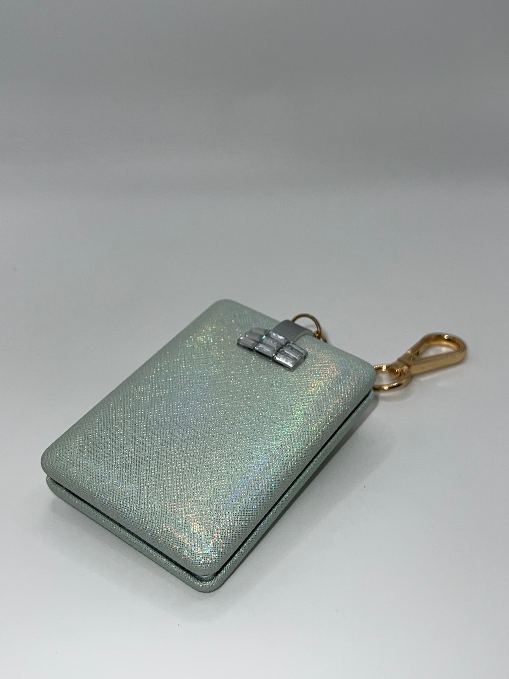 Iridescent green floral heart needle case