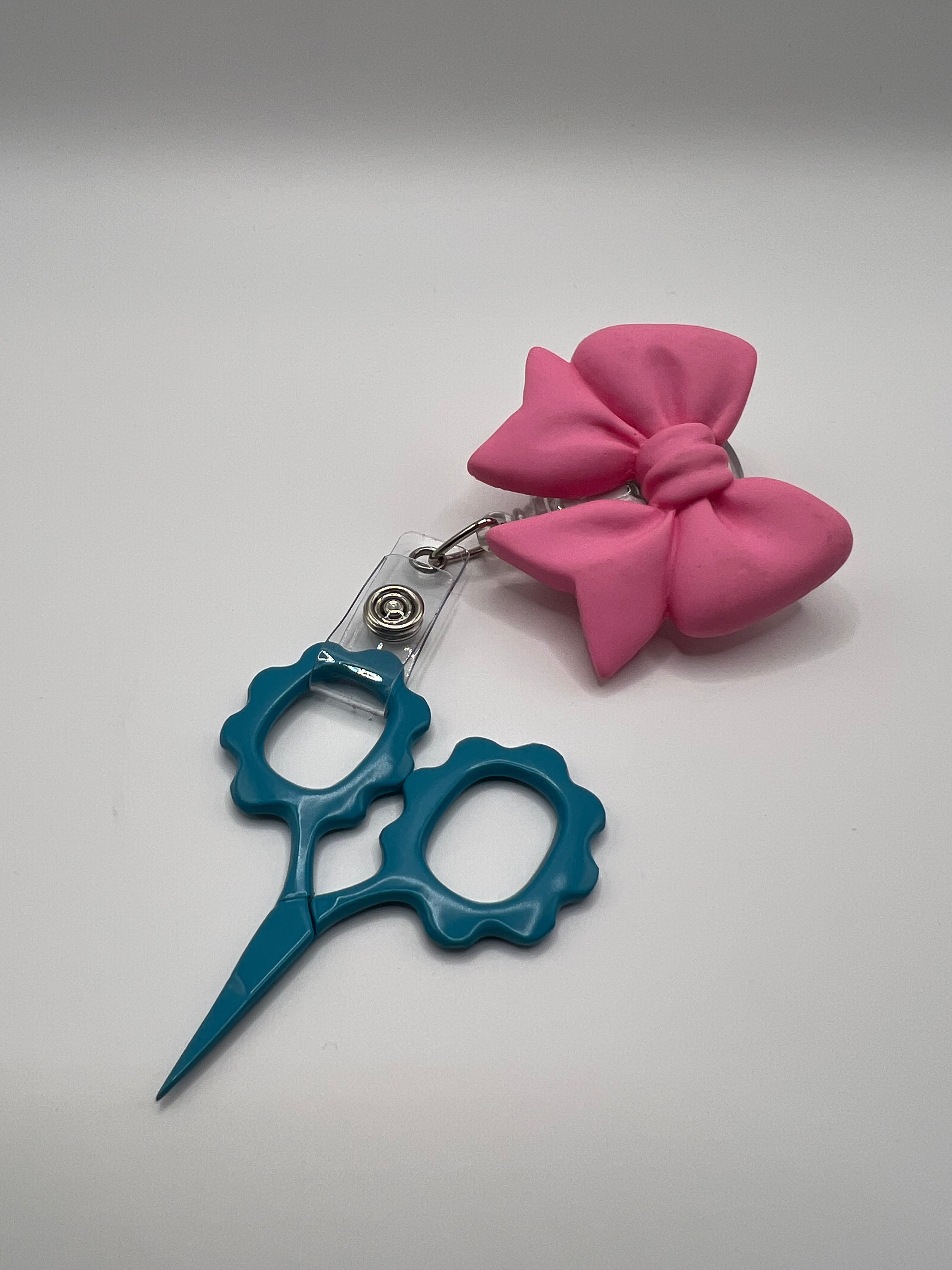 Hot pink bow - badge / scissor reel - scissors not included