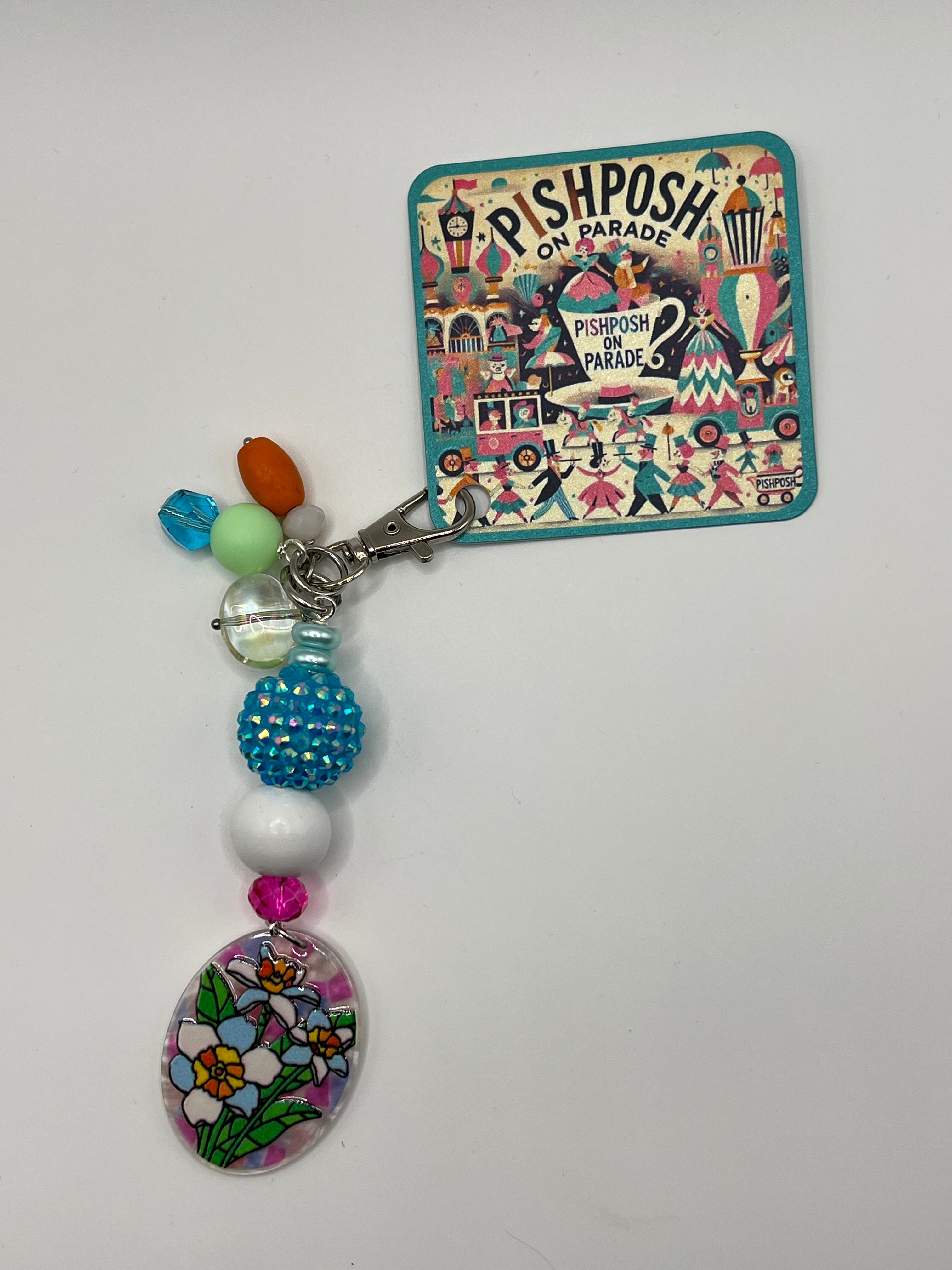 Oval shaped flowers with Blue white and pink beads charm
