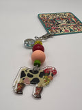 Holstein Cow in flowers and cowboy boots charm