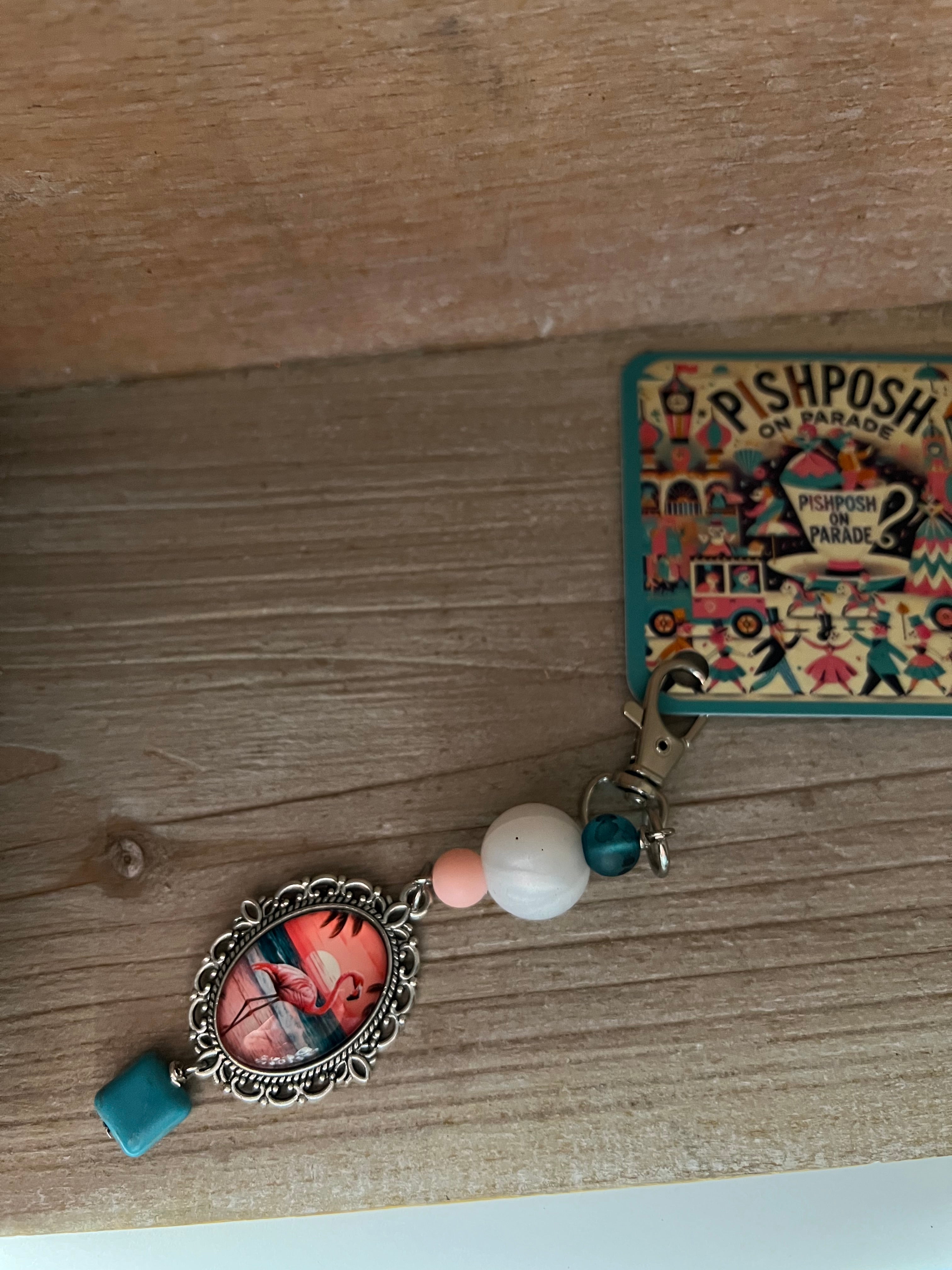 Flamingo with white bead charm
