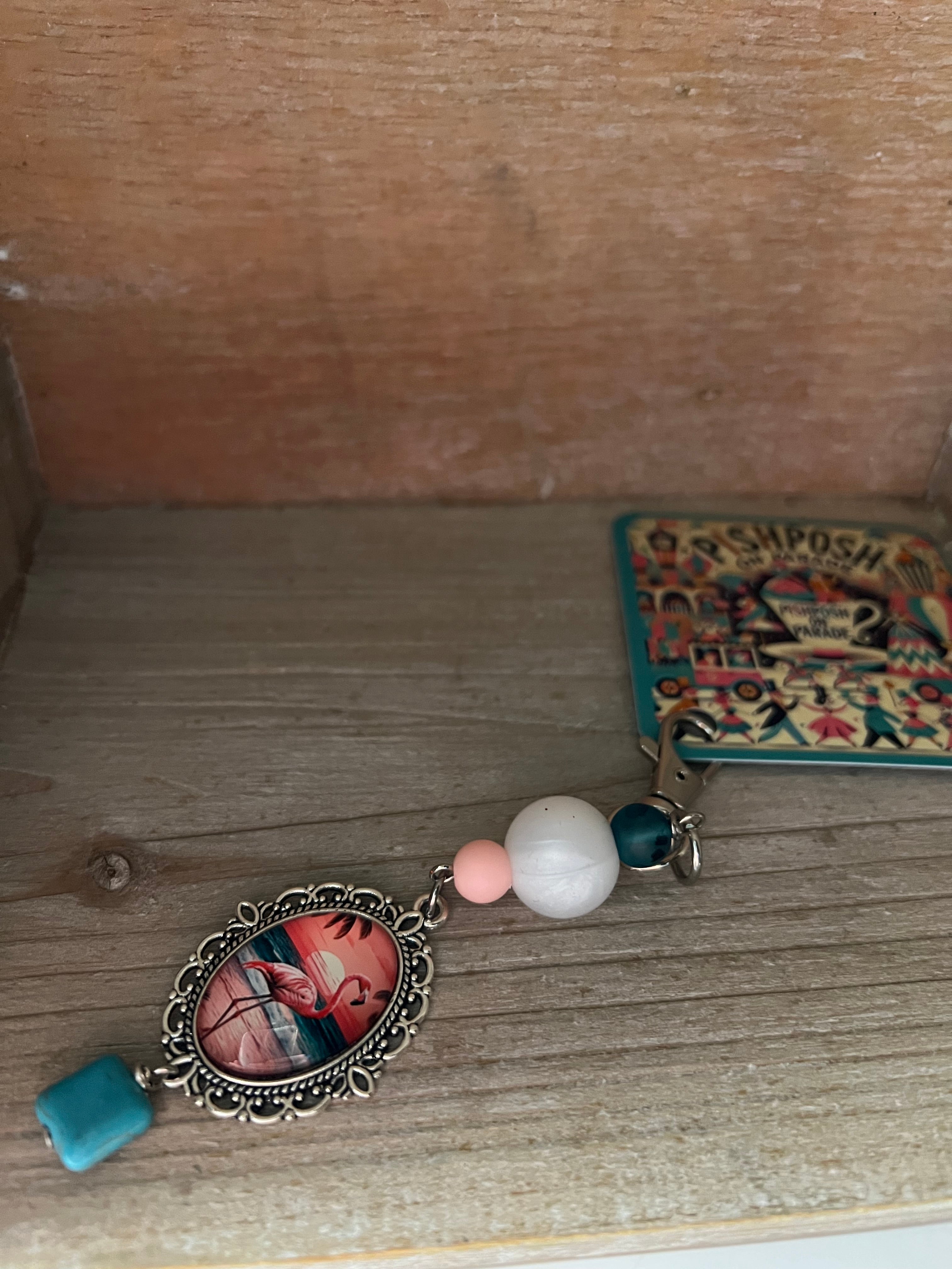 Flamingo with white bead charm