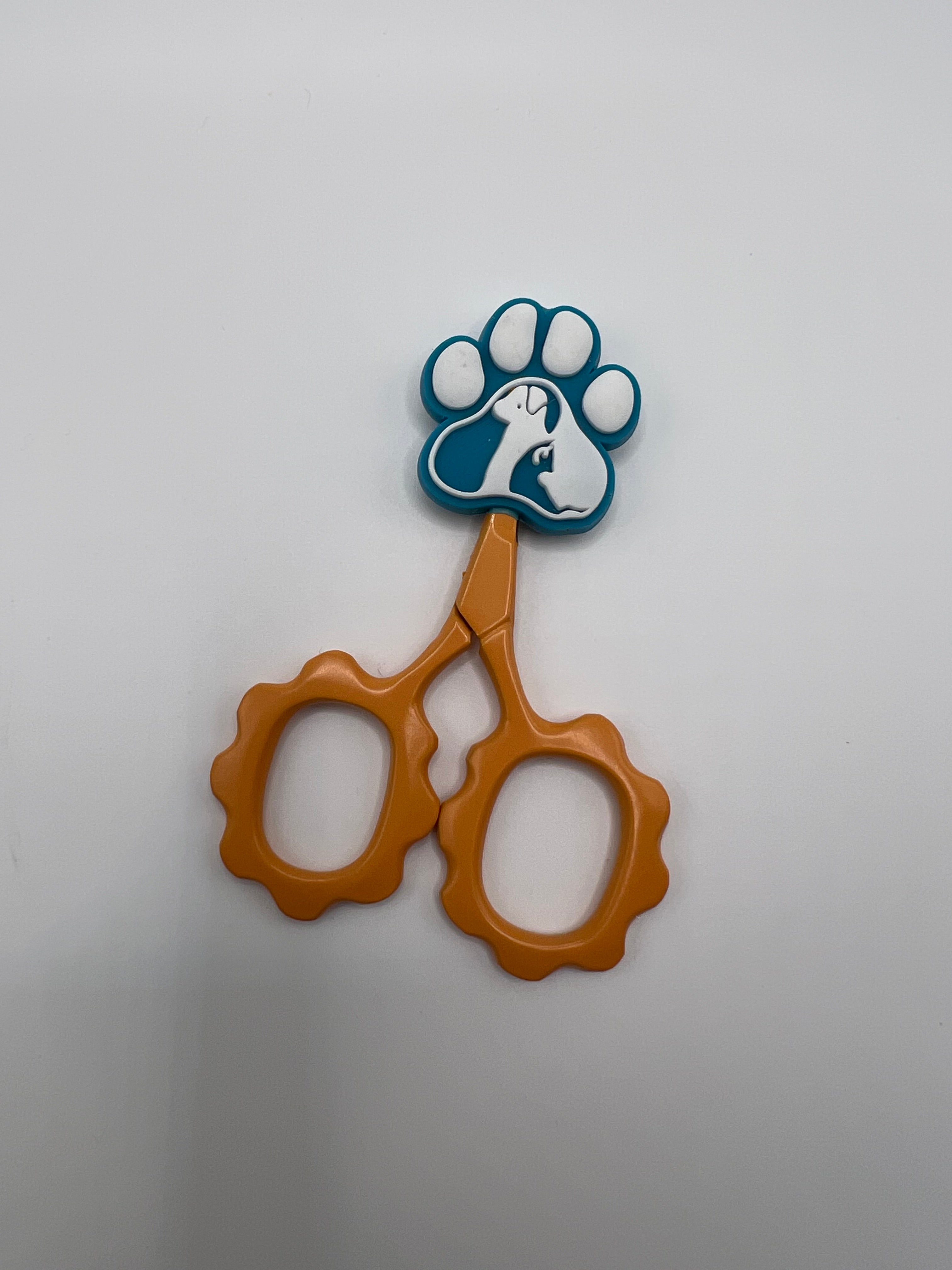 Blue and white paw print with silhouette dog - scissor tip protector