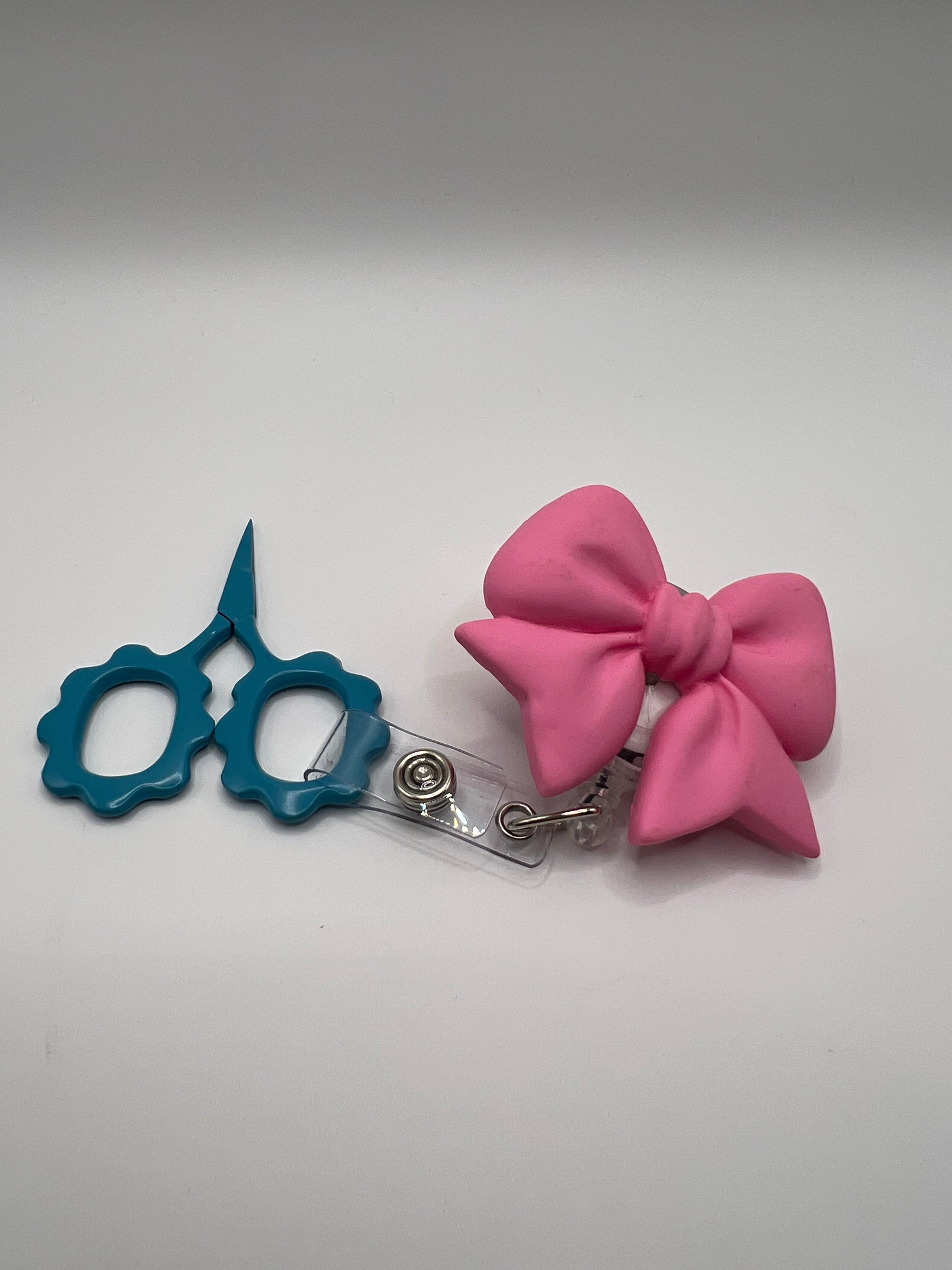 Hot pink bow - badge / scissor reel - scissors not included