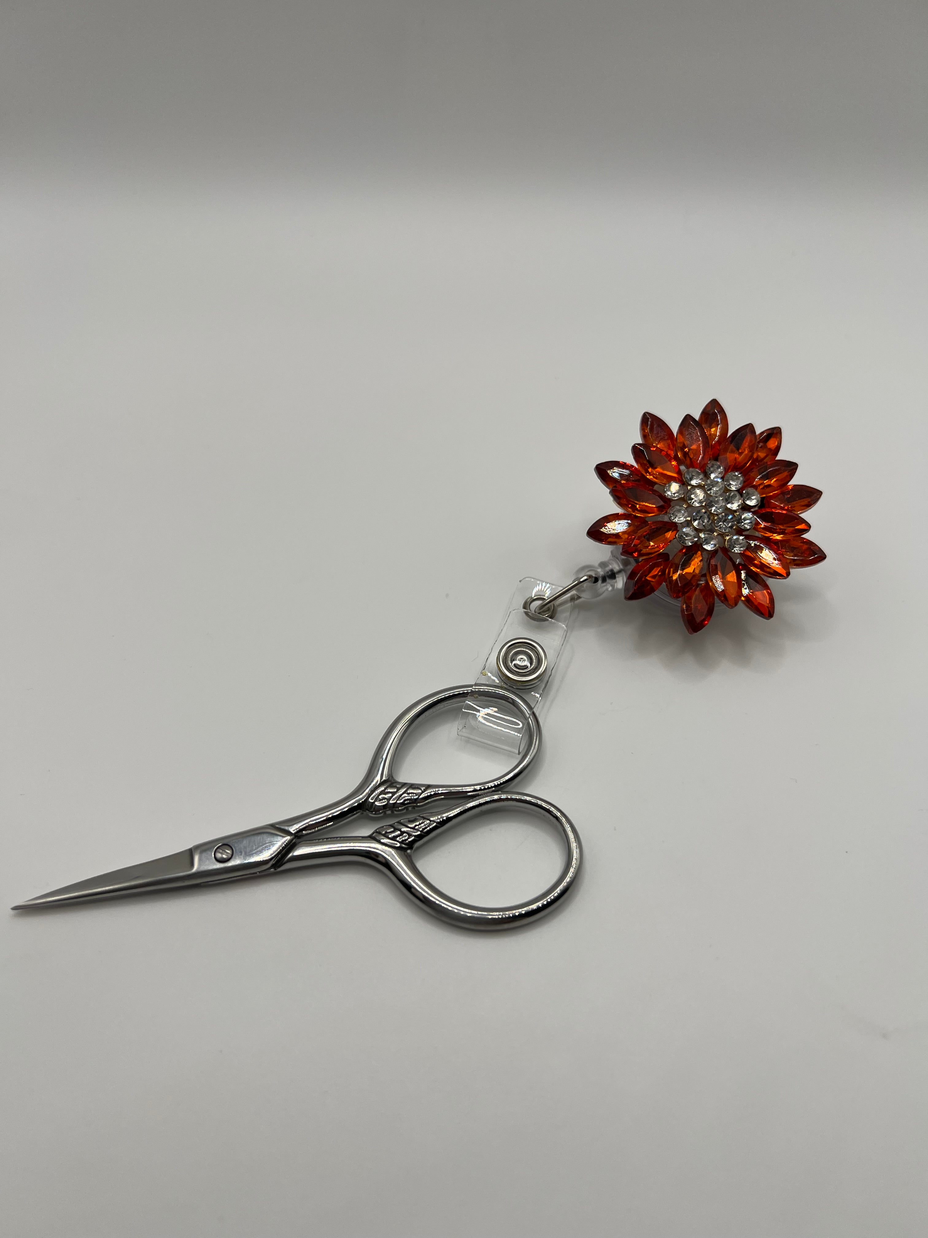 Orange and Clear Flower - Scissor Badge Reel