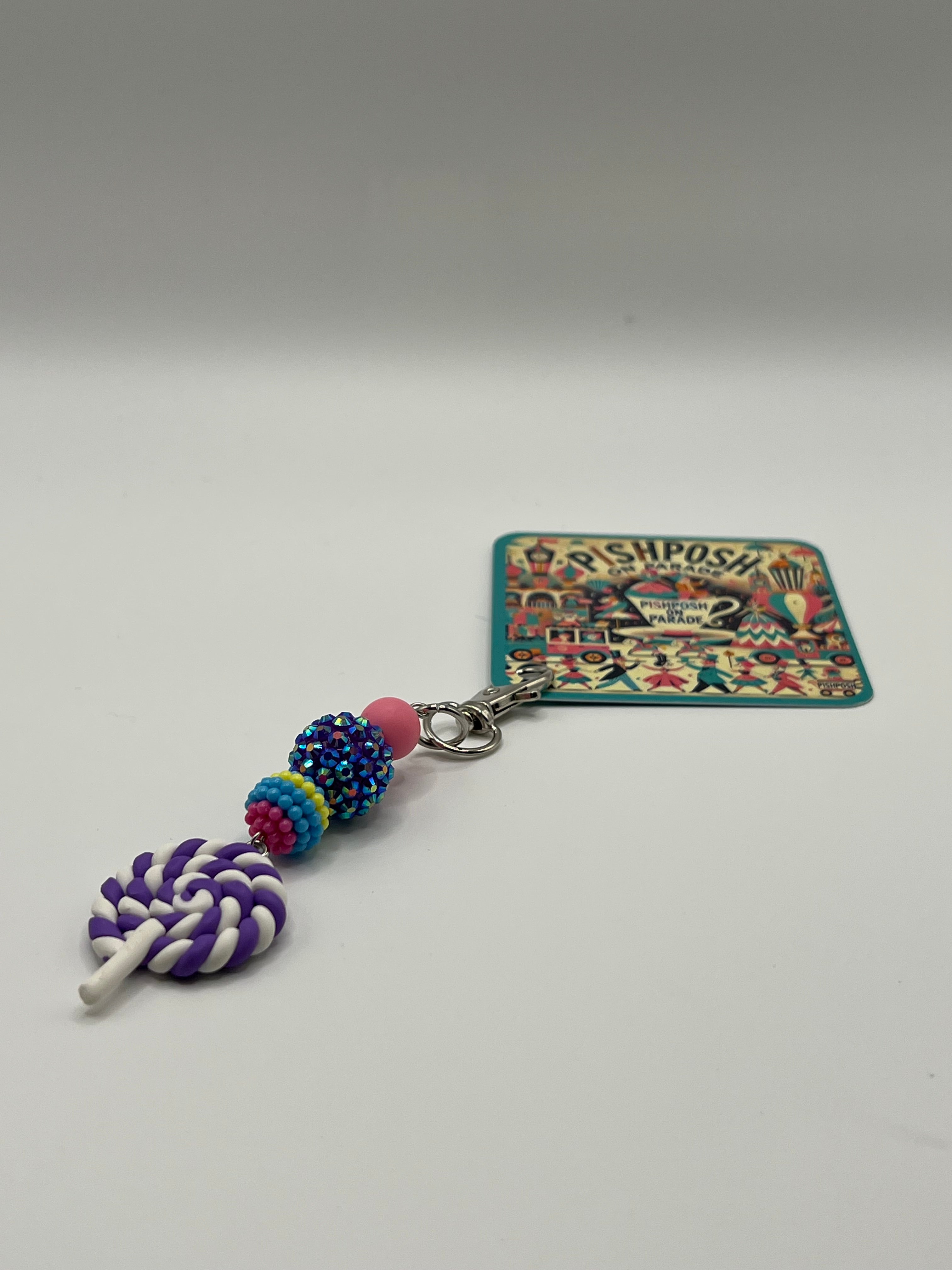 Purple and white swirl lollipop with purple bead - Charm / Bag Zipper Pull