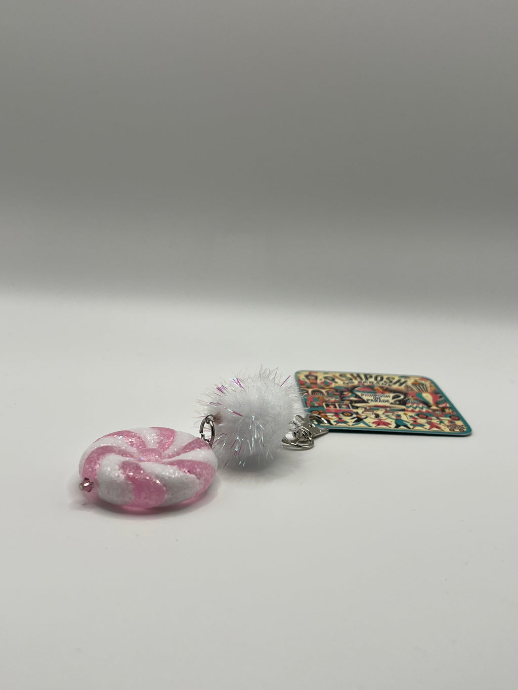 Pink and White swirl “candy” with fairy puff - Charm / Bag Zipper Pull