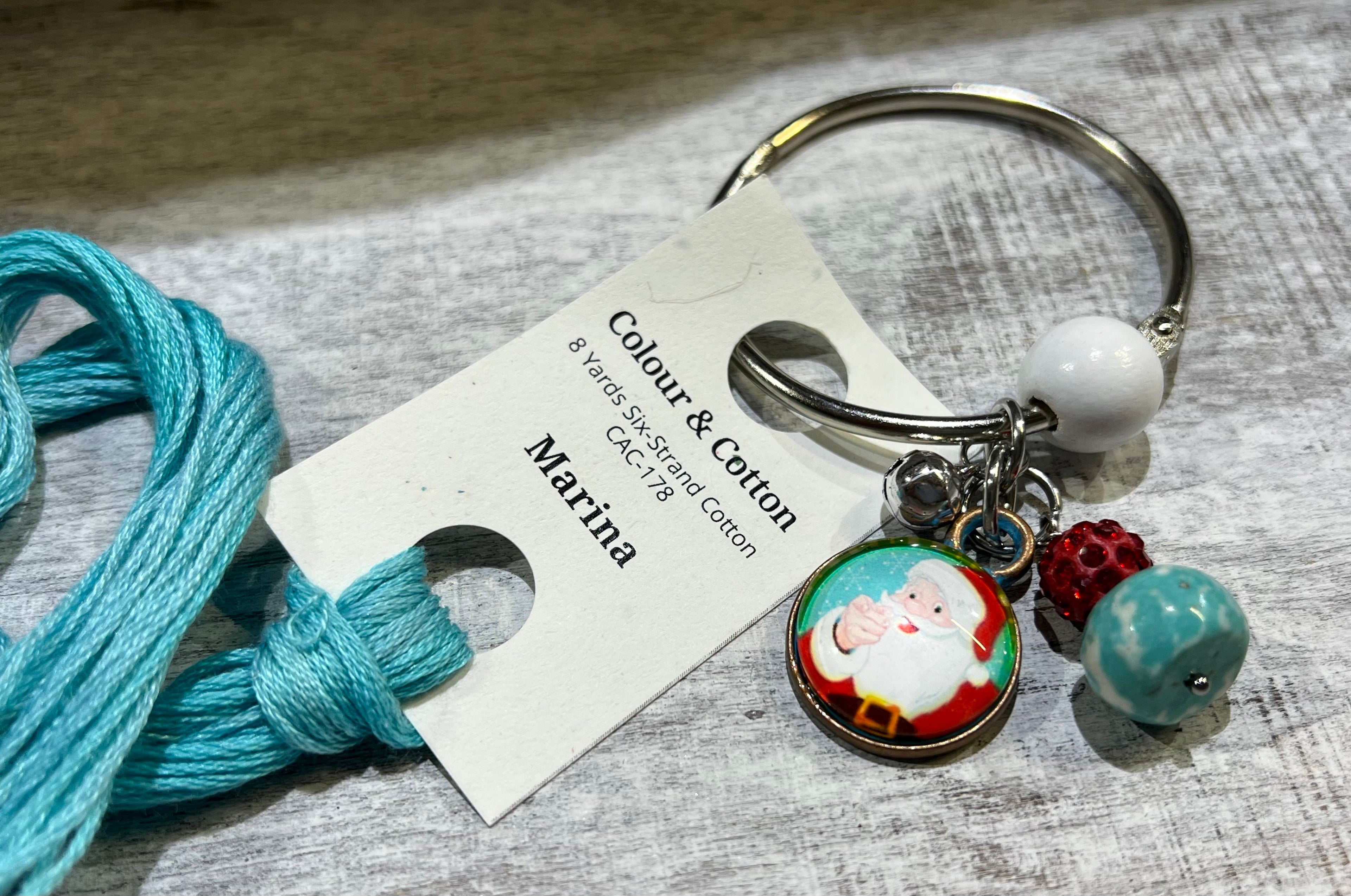 Santa with Turquoise - Floss Ring
