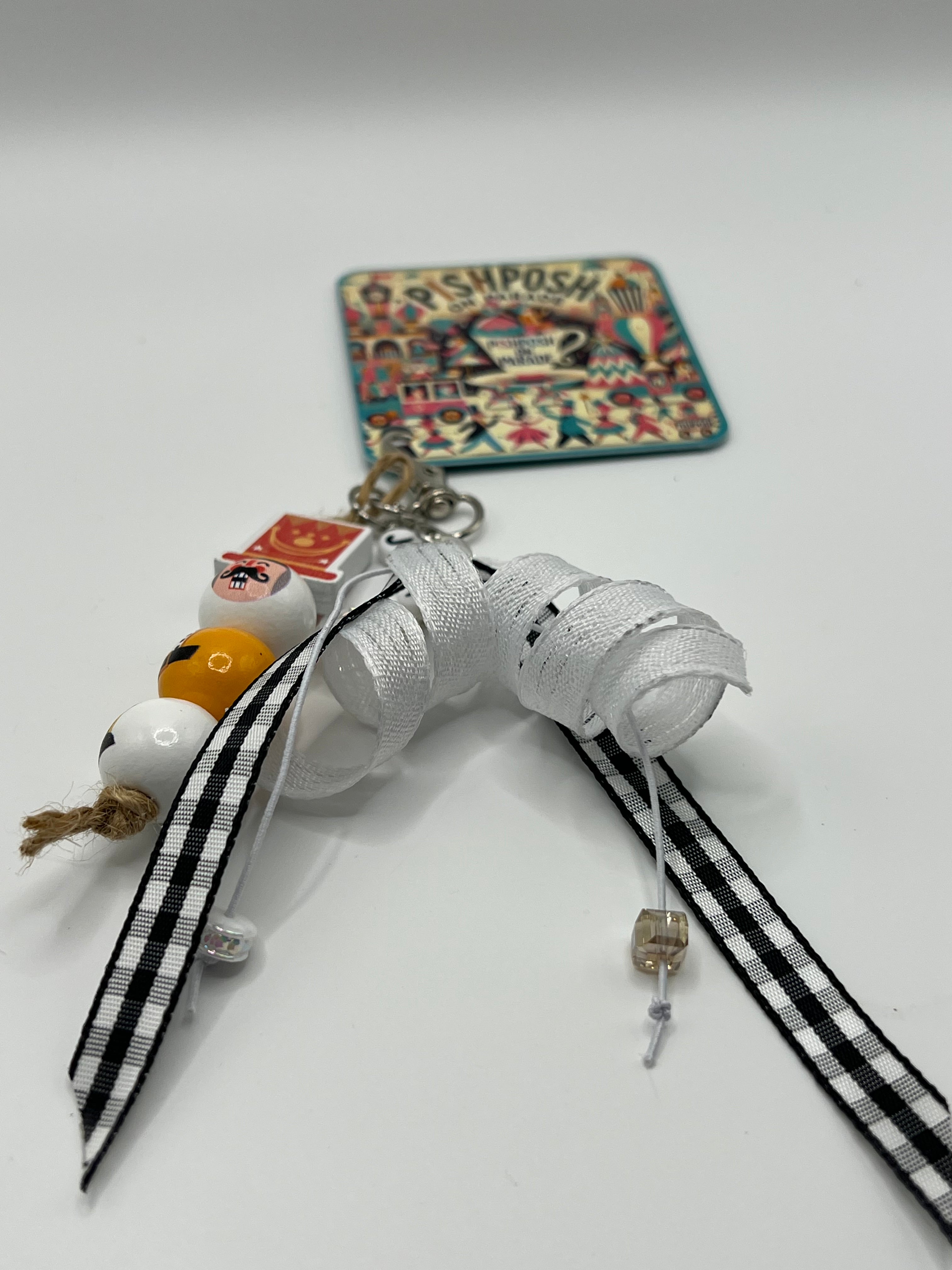 Nutcracker - “Joy” with Black and White ribbons - Charm / Bag Zipper Pull