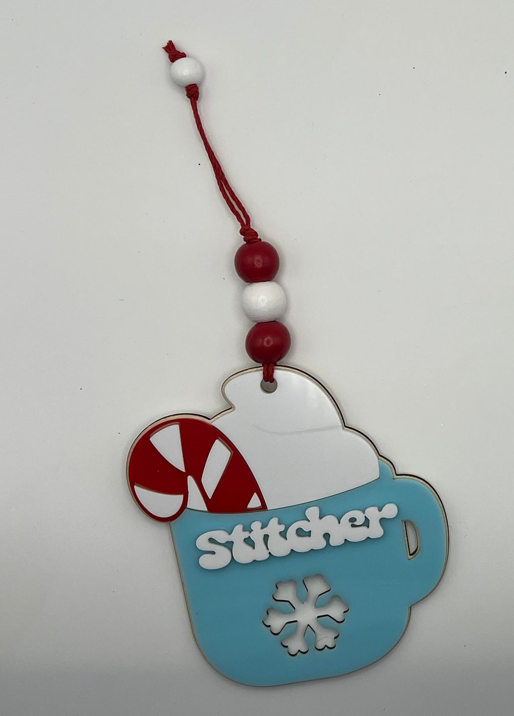 Stitcher Christmas ornament - Blue