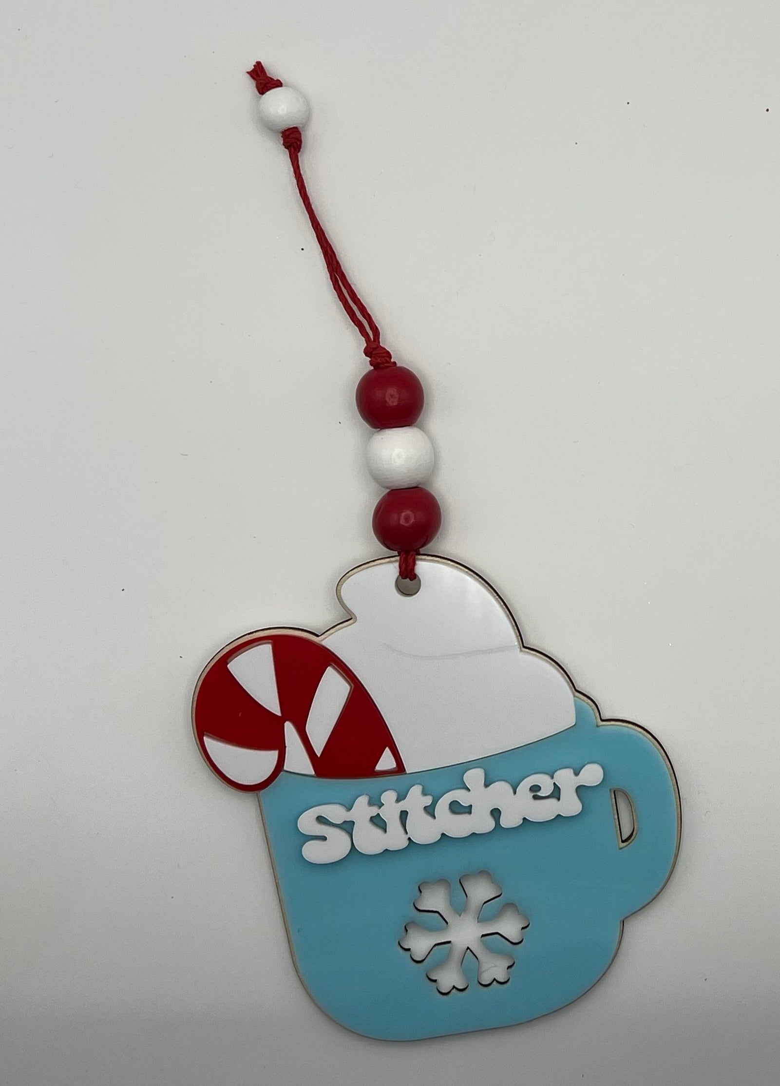 Stitcher Christmas ornament - Blue