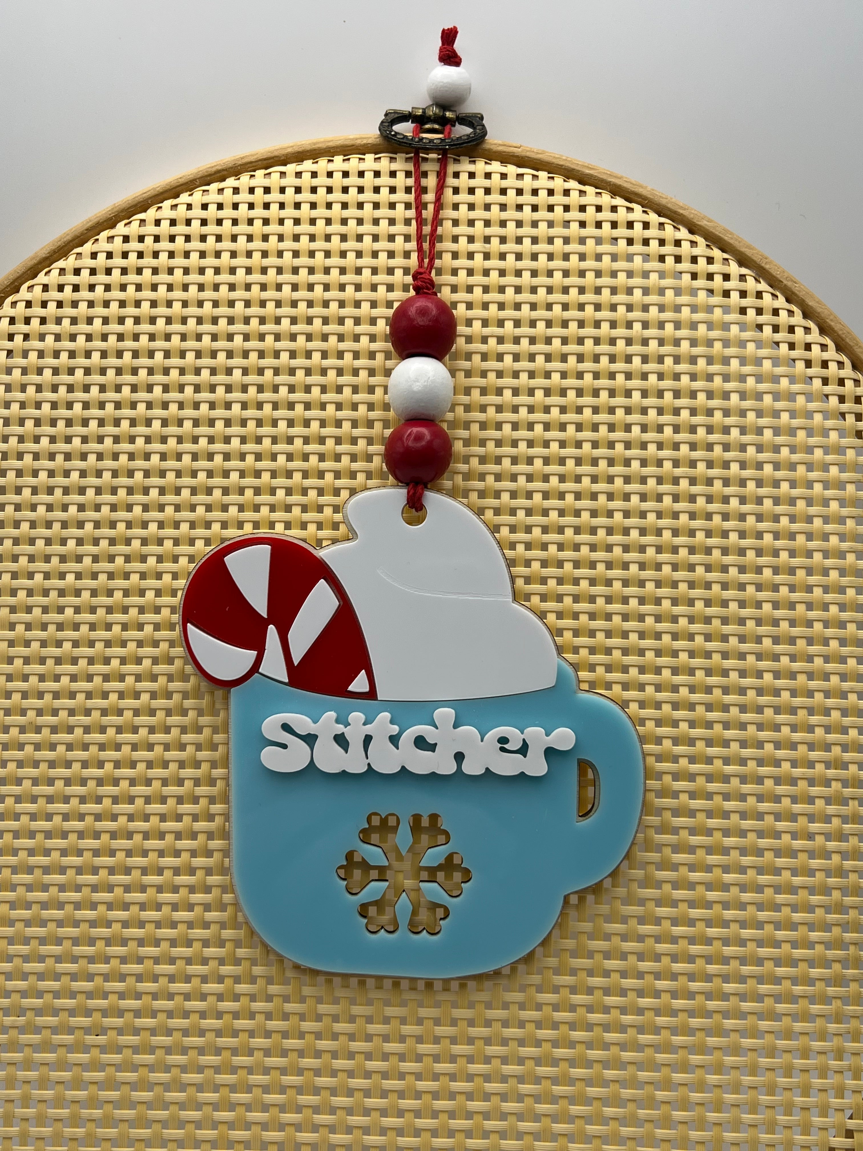 Stitcher Christmas ornament - Blue