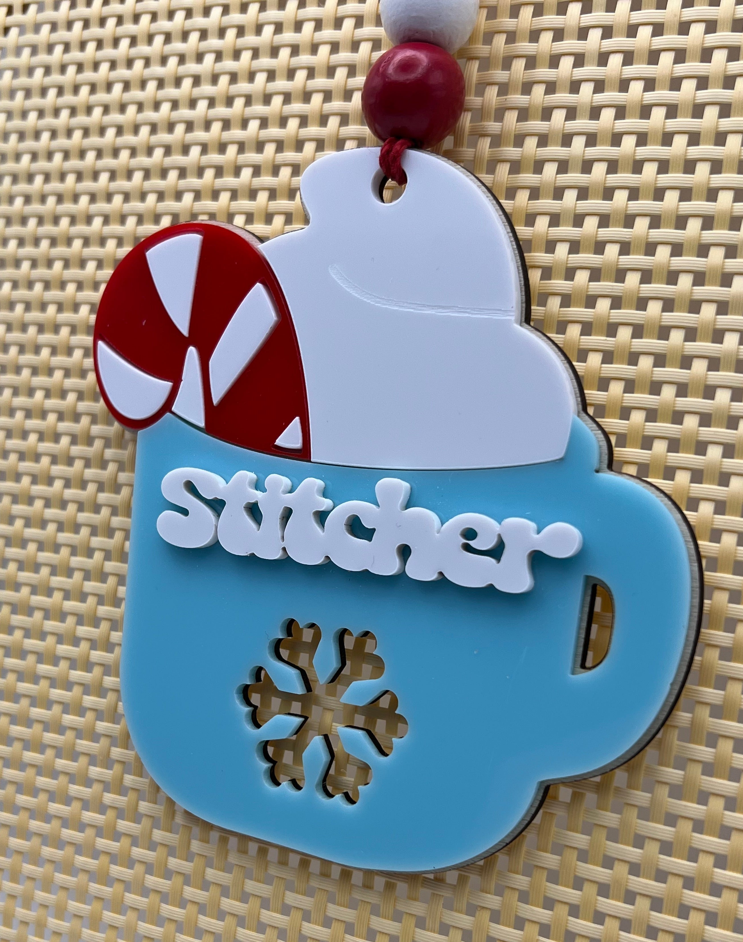 Stitcher Christmas ornament - Blue